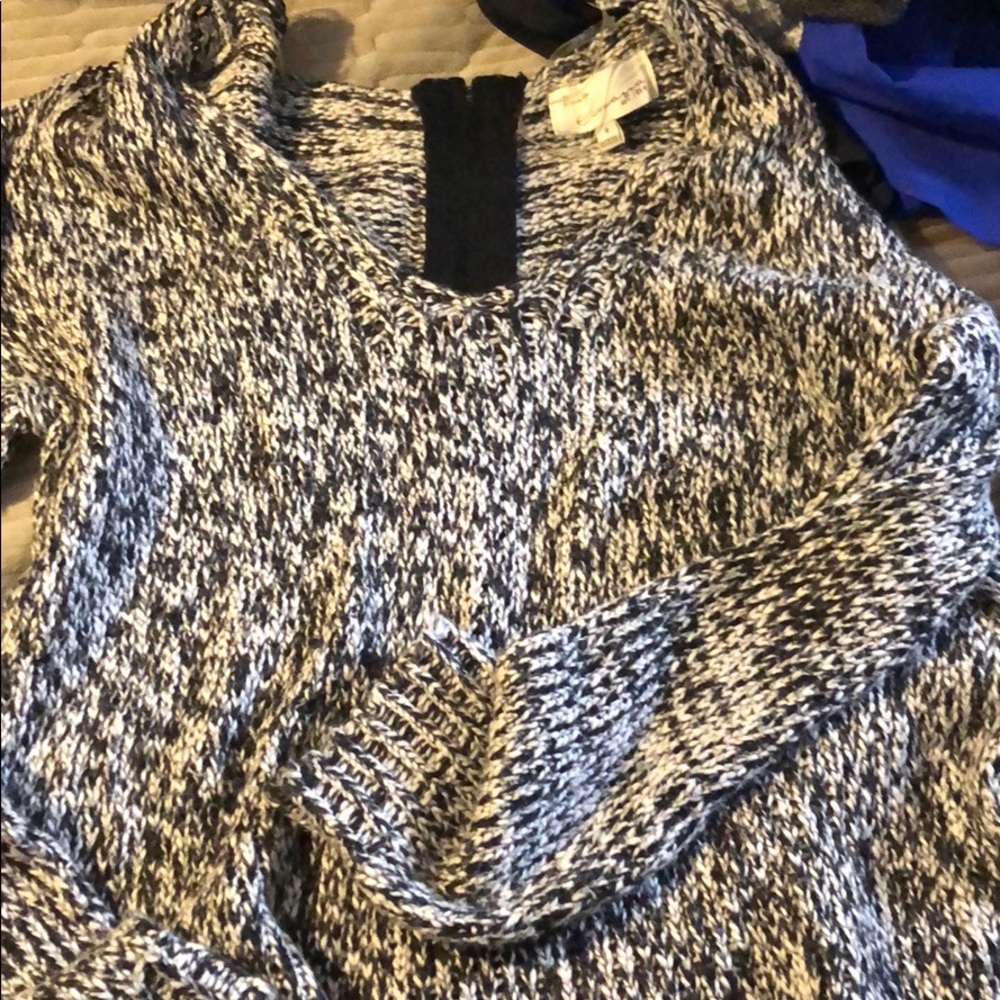 Sweater with zipper down the back